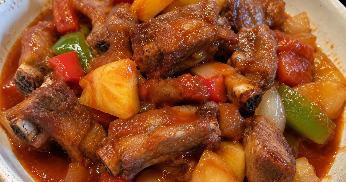 Hawaii-Chinese sweet sour spareribs — sticky brown-sugar pork bones with pineapple, bell pepper, and onion