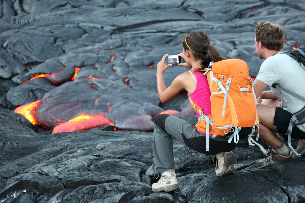 A pāhoehoe lava flow on the Big Island, the ropy black surface of cooled basalt. EarthCaches at sites like this turn a roadside pull-off into a self-guided geology lesson.