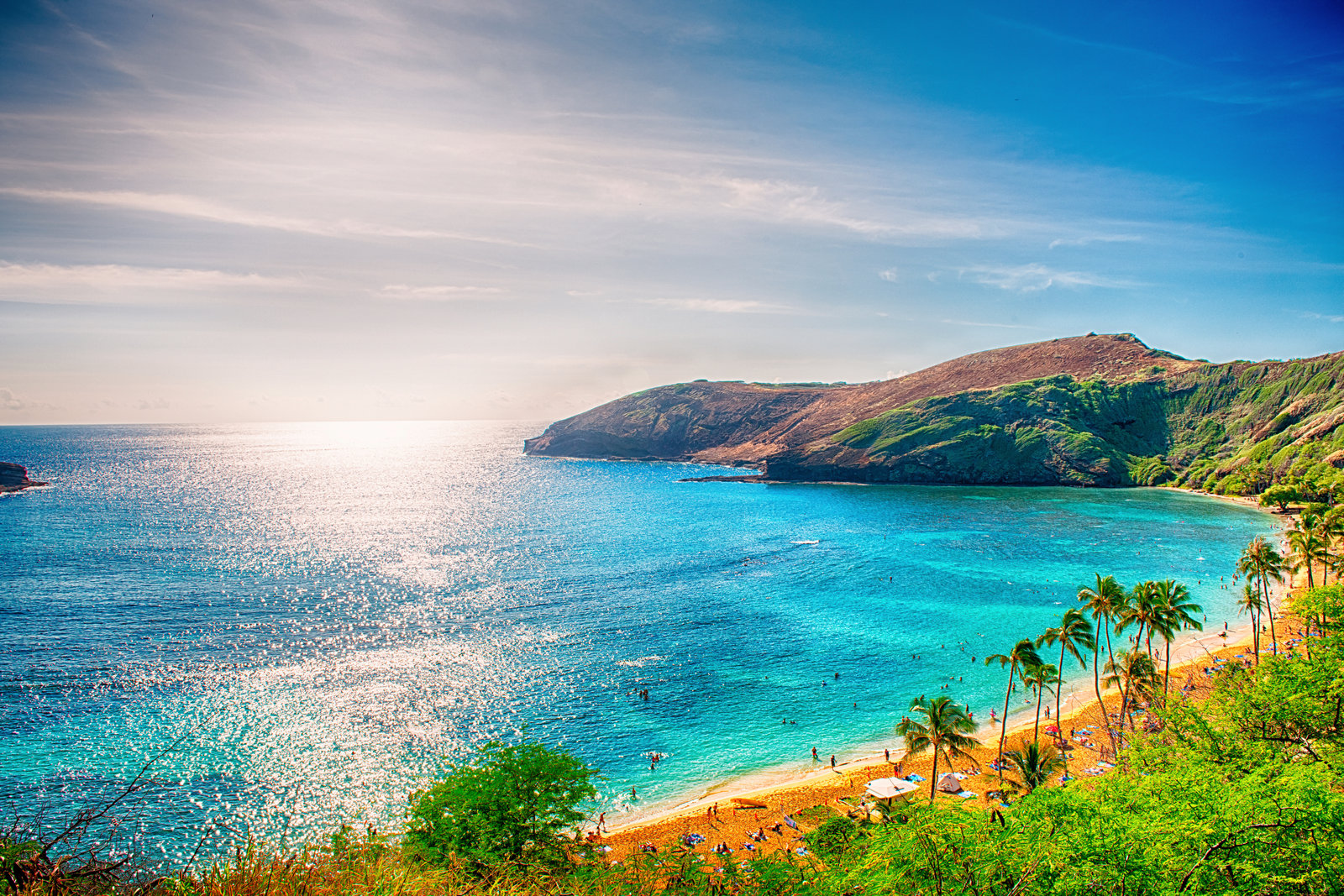 Hanauma Bay from the rim overlook on Oʻahu's southeast shore — a state nature preserve with a timed-reservation admission system