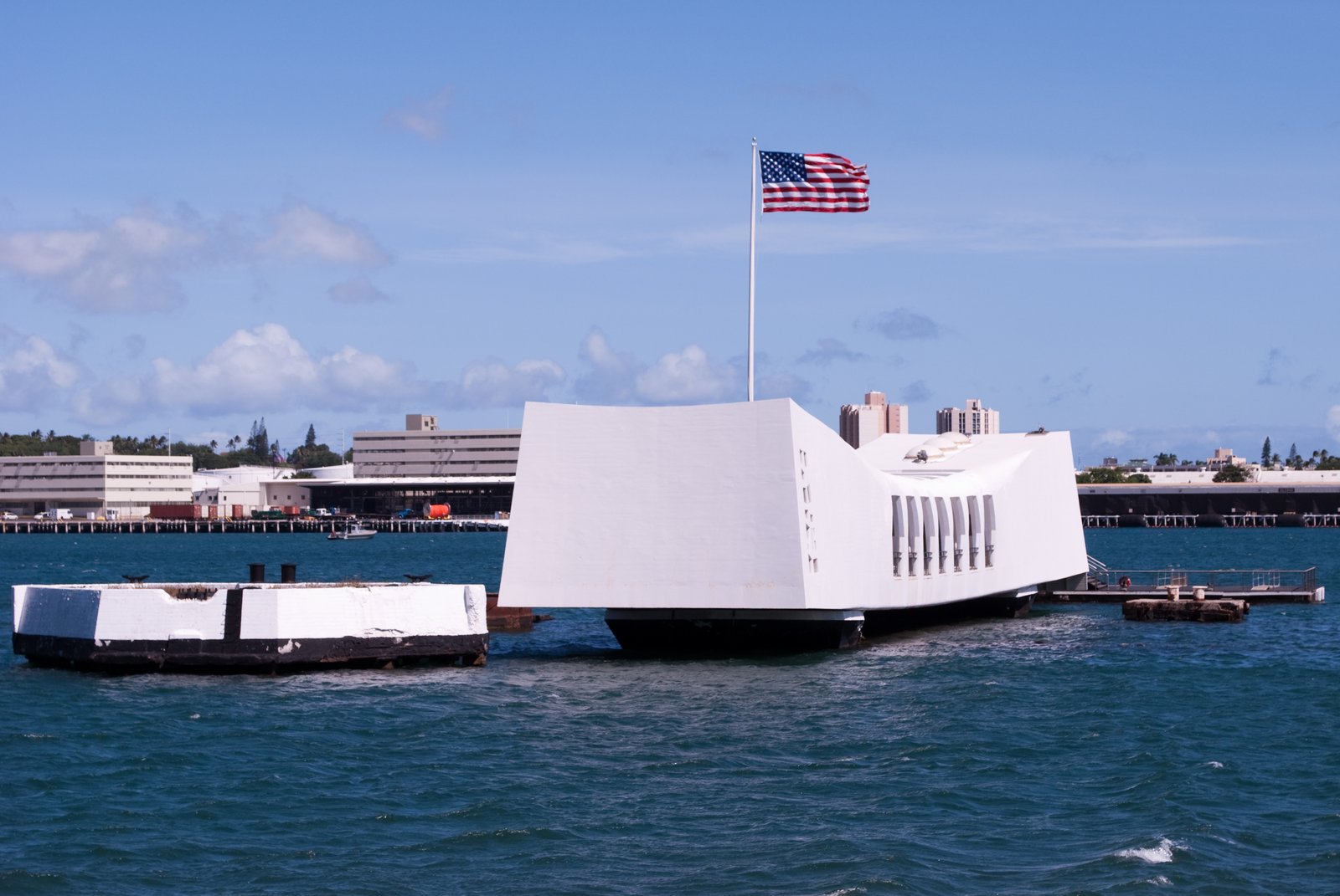 USS Arizona Memorial and the Pearl Harbor site on Oʻahu — the National Park Service admission is free, so it doesn't need to be on any pass