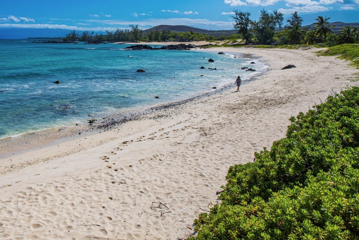 Makalawena Beach on the Kona coast at dawn, a leeward beach that goes glassy on trade-wind days and stirs up when winds turn southerly