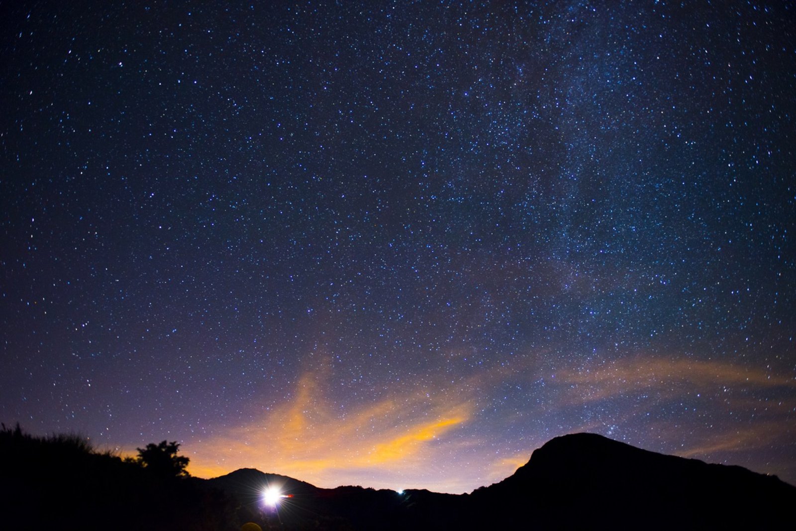 Mauna Kea under a sky full of stars during the Perseid meteor shower