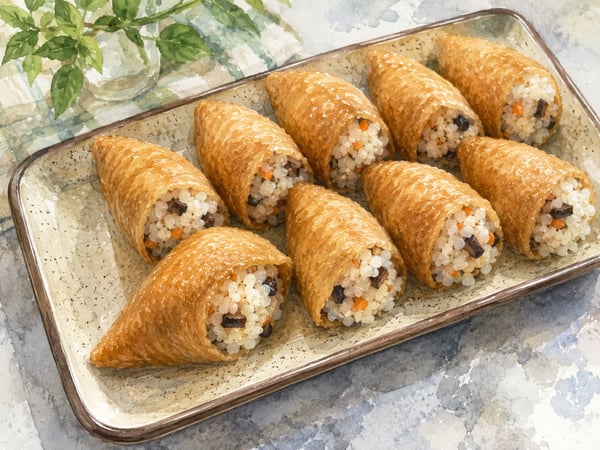 Watercolor illustration of Hawaii-style cone sushi (inari)