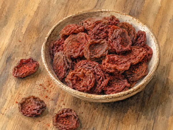Crack seed and li hing mui plums in a jar