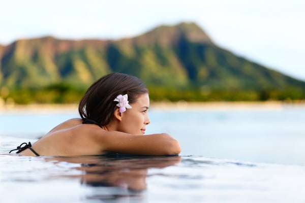 A quiet Waikīkī water portrait with Diamond Head behind, the Hawaiʻi people return to