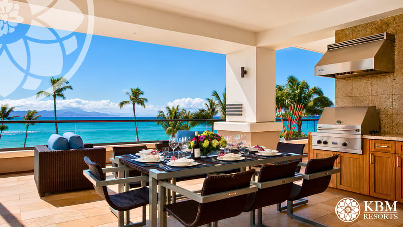 Ocean-view lanai dining area at a KBM Resorts vacation rental