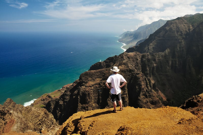 John at the Nualolo Cliffs overlook above the Na Pali Coast on Kauaʻi