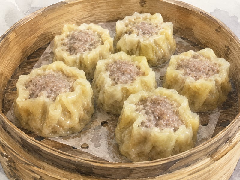 Watercolor illustration of Hawaii pork hash &mdash; open-topped steamed pork dumplings in a bamboo steamer