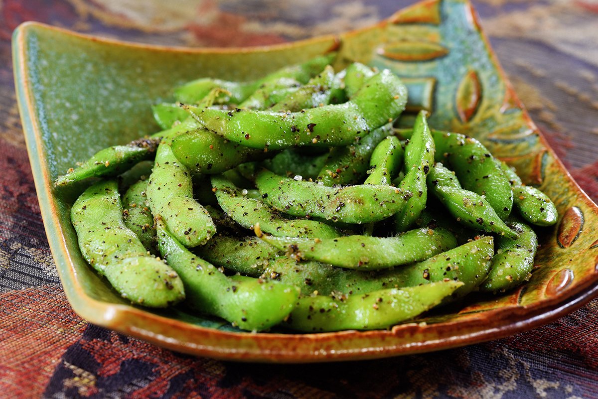 Poke style (seasoning) Edamame is a must try while on the islands. This favorite consists of sesame oil, sea salt, and fresh garlic and chili pepper bits.