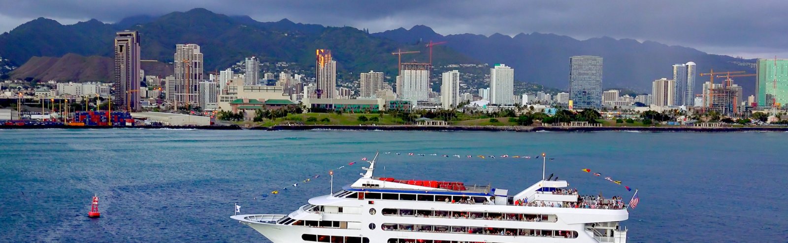 A dinner cruise ship out for a ride in the Honolulu Harbor.
