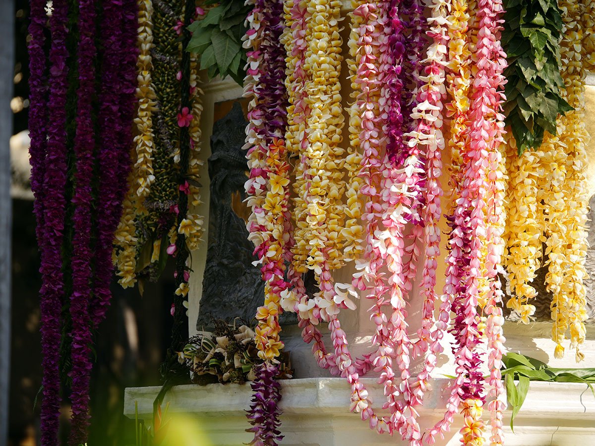 King Kamehameha statue draped with long flower lei during the annual lei draping ceremony in Honolulu
