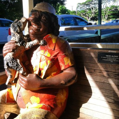 Moki and dog statue in Old Koloa Town on the island of Kauai in Hawaii