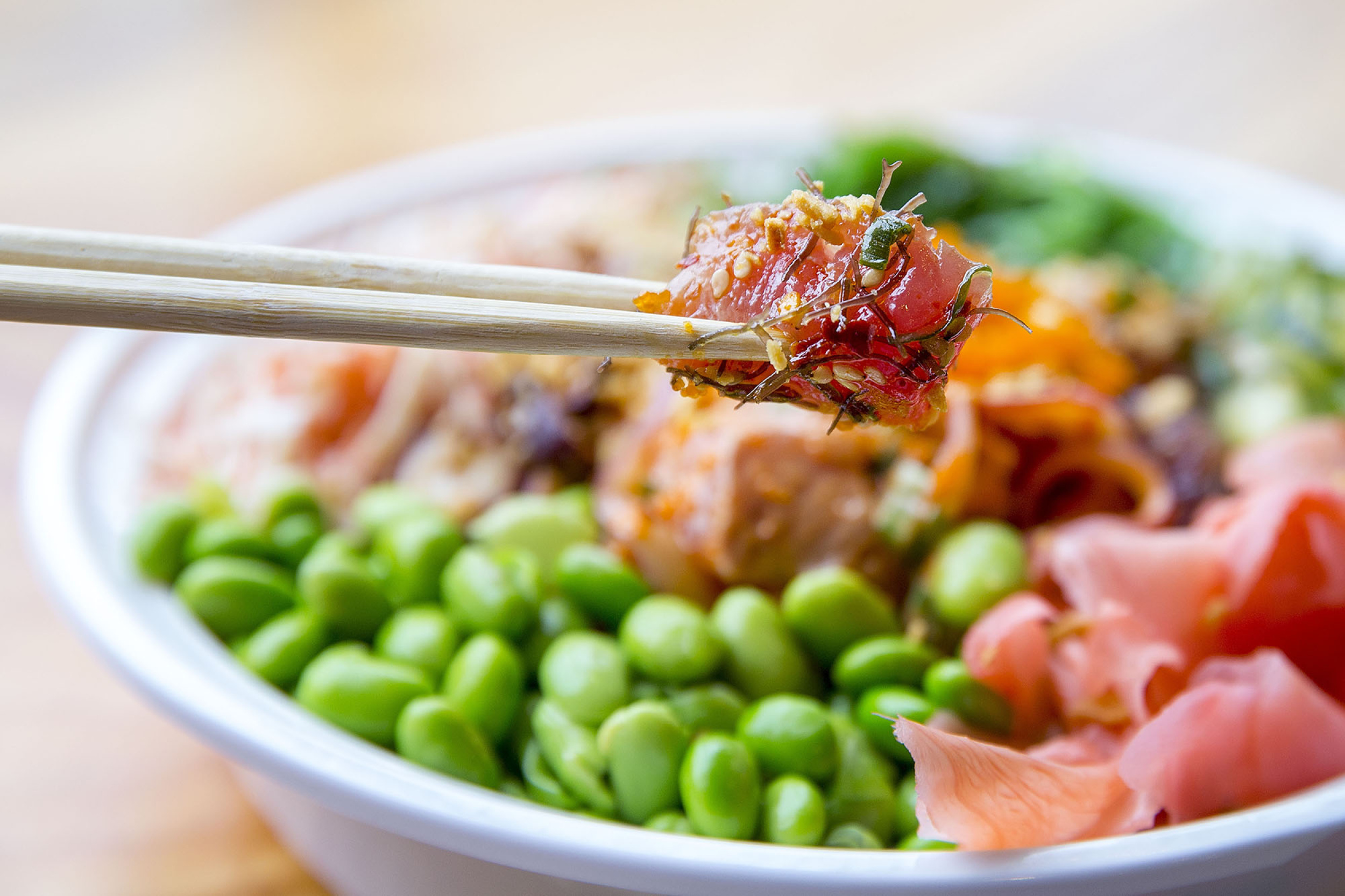 Fresh Hawaiian poke bowl with ahi tuna, rice, and toppings