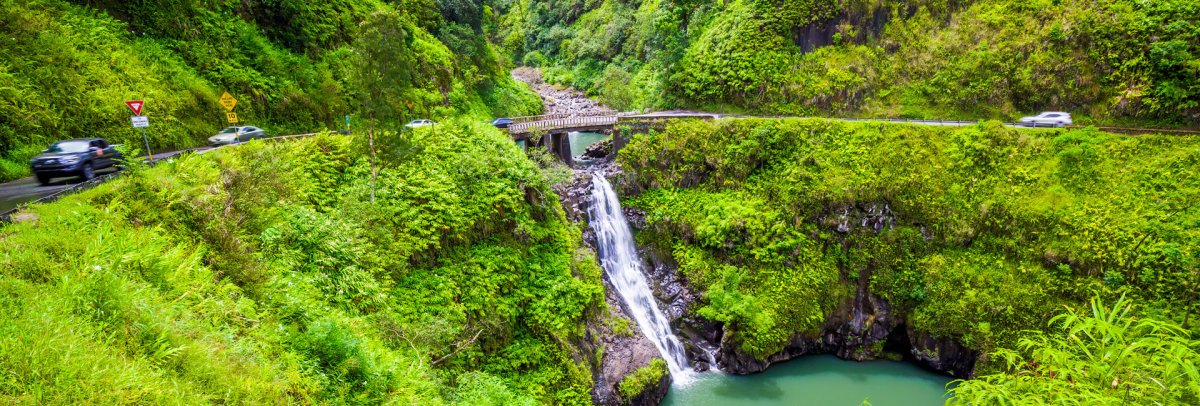 Winding Road to Hana highway along Maui's lush northeastern coastline Tile Image