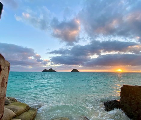 The water and sunrise at Lanikai Beach, one the most popular beaches to visit in Hawaii